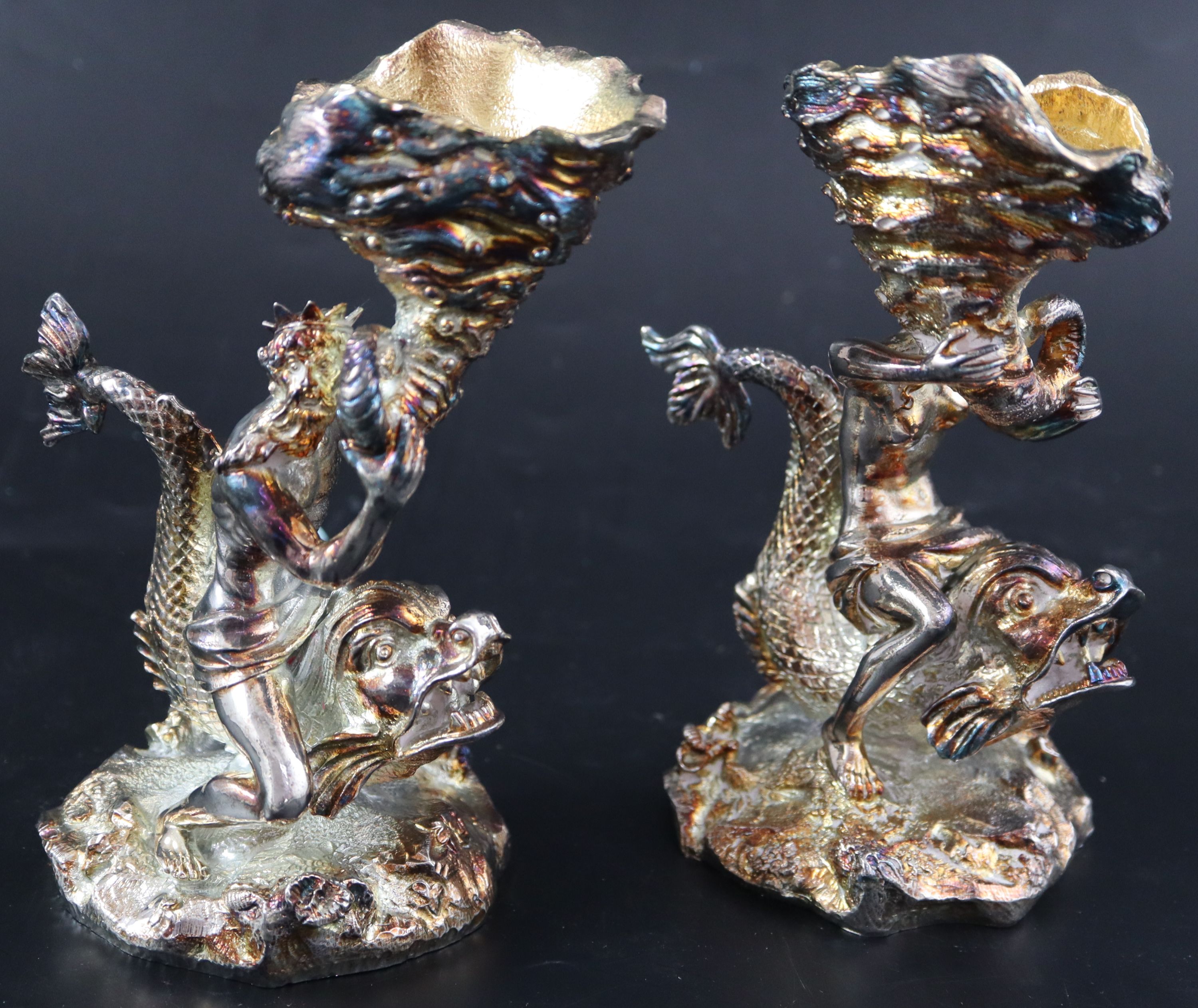 Two pairs of modern silver plated figural table salts, 17cm (one pair a.f.).